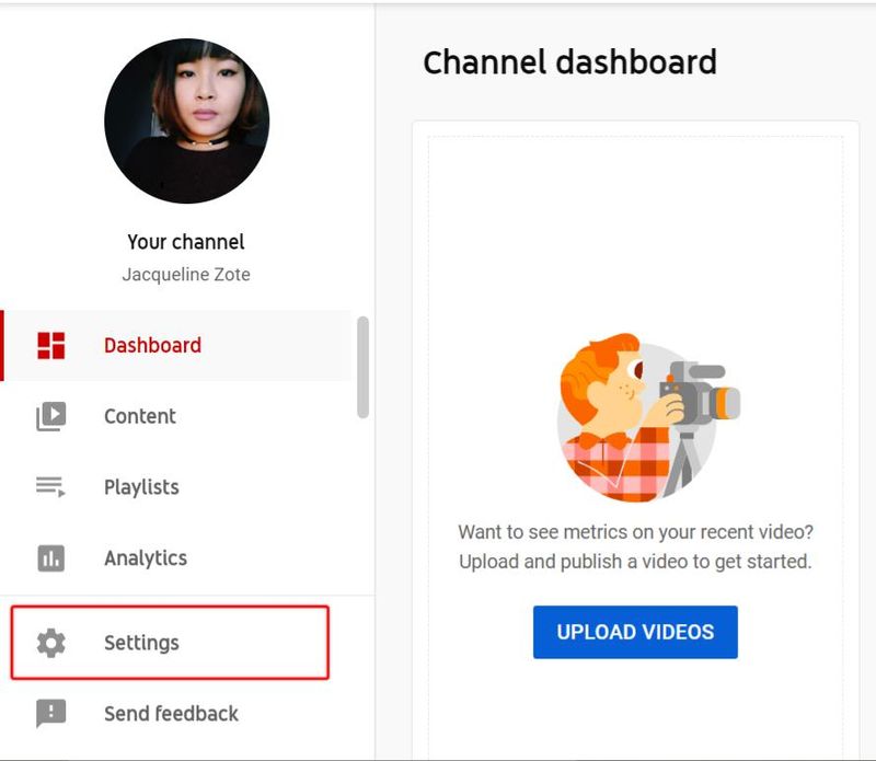 Dashboard di YouTube Creator Studio con segno rosso che indica il pulsante Impostazioni