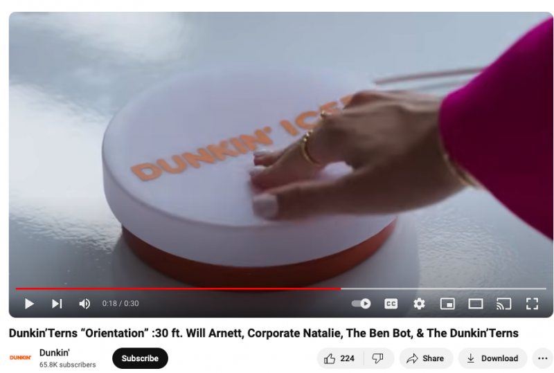   Un vídeo de YouTube de Dunkin Donuts, que presenta una colaboración con la influencer Corporate Natalie y el actor Will Arnett.