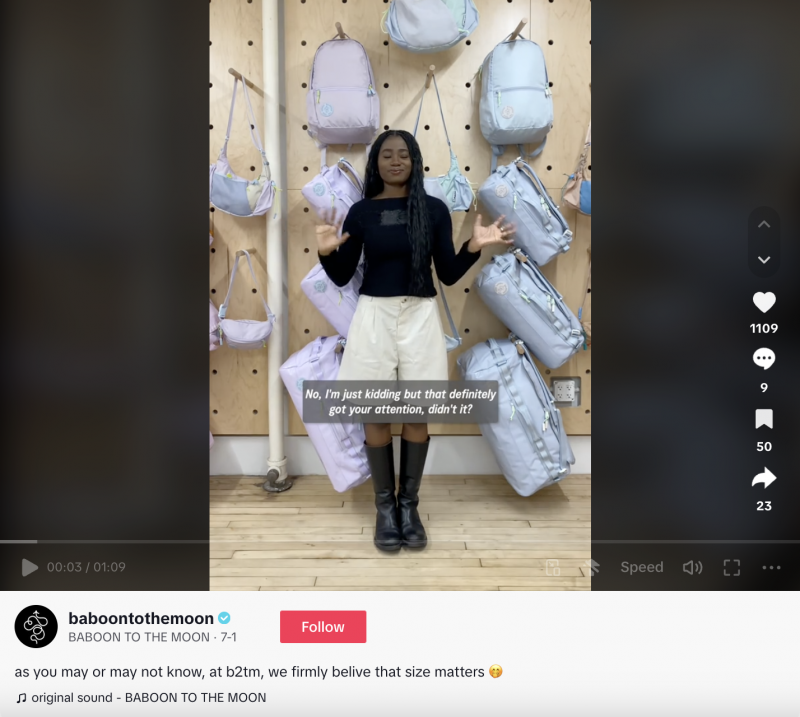   Une vidéo TikTok de Baboon to the Moon où Jess se tient devant la marque's iconic wall of bags and introduces the latest collection